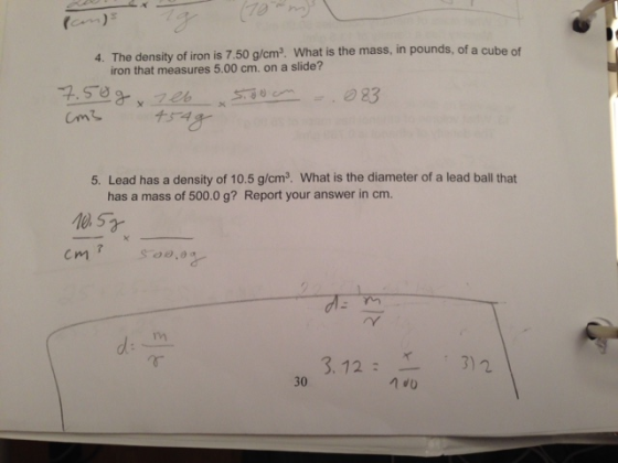 (am) 4. The density of iron is 7.50 g/cm2. What is the mass, in pounds, of a cube of iron that measures 5.00 cm, on a slide?