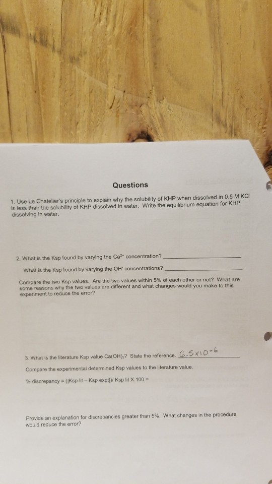 Questions 1. Use Le Chateliers principle to explain why the solubility of KHP when dissolved in 0.5 M KCI is less than the s