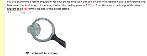 You are examining a recent acquisition for your stamp collection through a hand-held reading glass (a converging lens). Deter