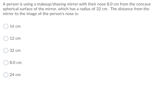 A person is using a makeup/shaving mirror with their nose 8.0 cm from the concave spherical surface of the mirror, which has