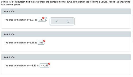 Using a TI-84 calculator, find the area under the standard normal curve to the left of the following z-values. Round the answ