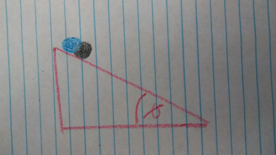 Two spheres of equal mass M and equal radius R rol