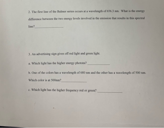 2. The first line of the Balmer series occurs at a wavelength of 656.3 nm. What is the energy difference between the two ener