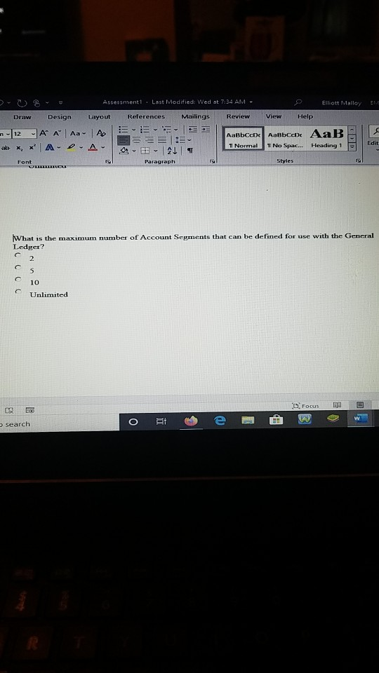 Assessment - Last Modified: Wed at 7:34 AM - Elliott Malloy Draw Design Layout References Mailings Review View Help -12 - A A