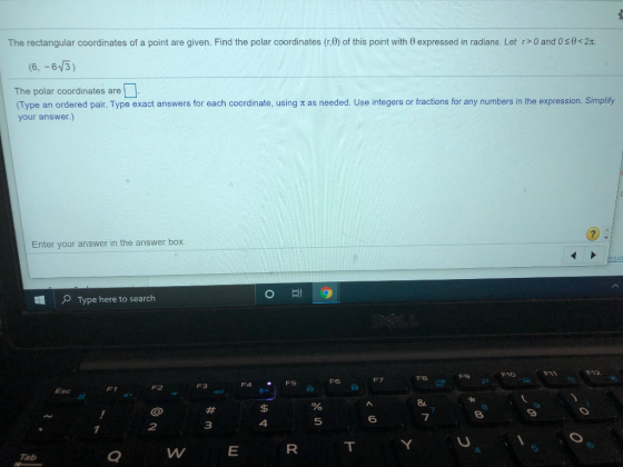 The rectangular coordinates of a point are given. Find the polar coordinates (r.) of this point with expressed in radians. Le
