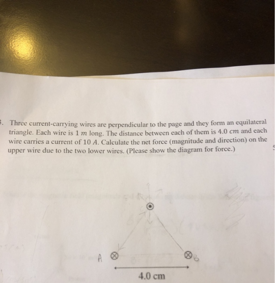 5. Three current-carrying wires are perpendicular to the page and they form an equilateral triangle. Each wire is 1 m long. T