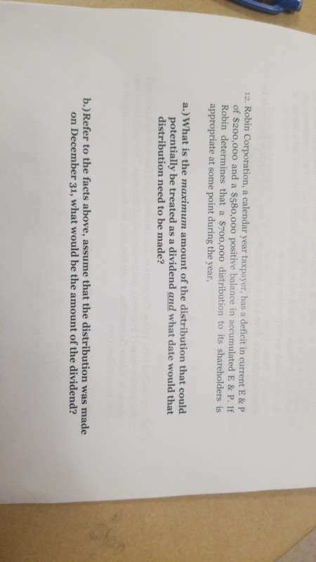12. Robin Corporation, a calendar year taxpayer, has a deficit in current E & P of $200,000 and a $580,000 positive balance i