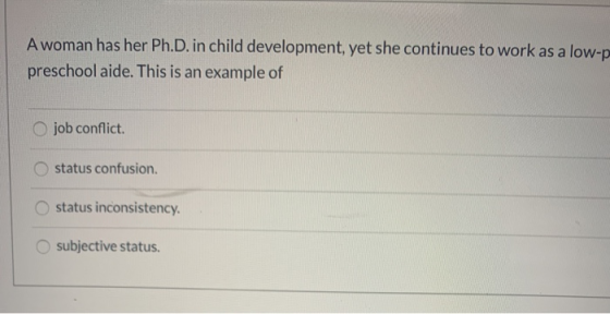 A woman has her Ph.D. in child development, yet she continues to work as a low-p preschool aide. This is an example of job co