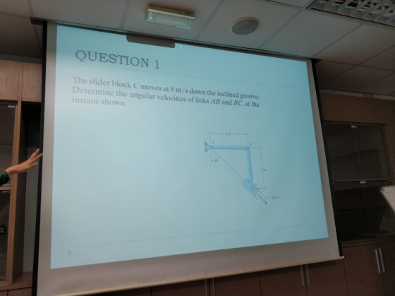 QUESTION 1 The slider block C moves at 8 m/s down the inclined groove. Determine the angular velocities of links AB and BC.at the instant shown