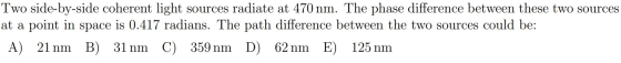 Two side-by-side coherent light sources radiate at 470 nm. The phase difference between these two sources at a point in space