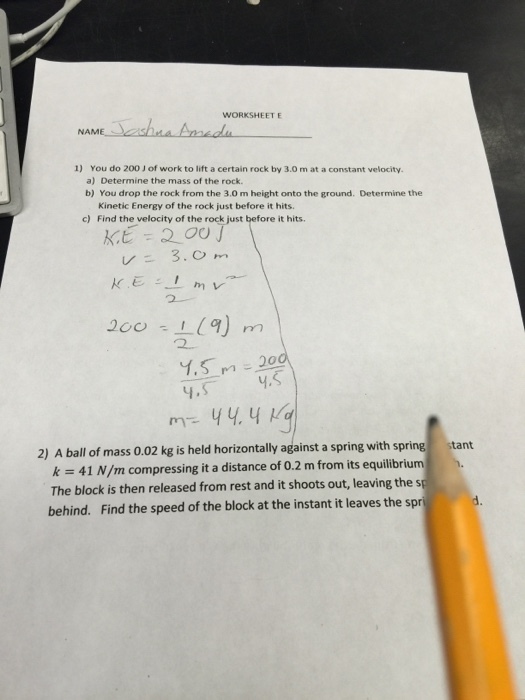 You do 200 J of work to lift a certain rock by 3.0
