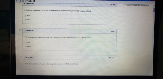 → XCO Question 1 2.5 pts 1 Hour, 57 Minutes, 36 Seconds In both transport layer protocols, reliable and guaranteed delivery o