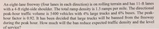 An eight-lane freeway (four lanes in each direction) is on rolling terrain and has 11-ft lanes with a 4-ft right-side shoulde