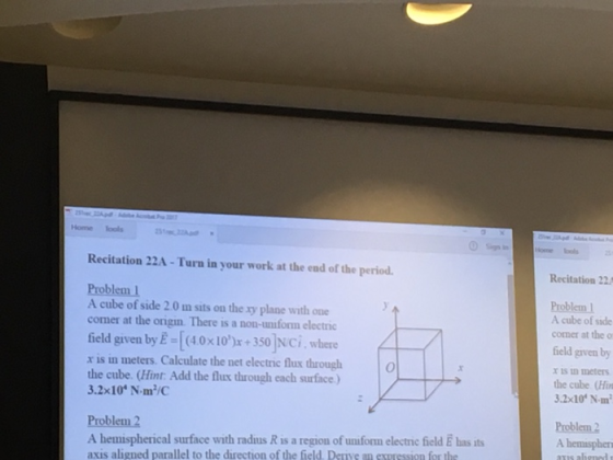 Home lools zi Recitation 22A- Turn in your work at the end of the period Recitation 22 Problem A cube of side 2.0 m sits on the xy plane with ond comer at the origin There is a non-unform electric Problem A cube of side coner at the o field given by E-((40 x 10)x + 350]NCi, where r is in meters. Calculate the net electric flux through the cube. (Hint Add the flux through each surface) 3.2x10 N.㎡/C field given by x is n meters the cube (Hi 3.2x10 Nm Problem 2 A hemispherical surface with radius R is a region of unform electnic field E has its axis aligned parallel to the direction of the field. Derive an expression for the Problem 2 A hemisphen