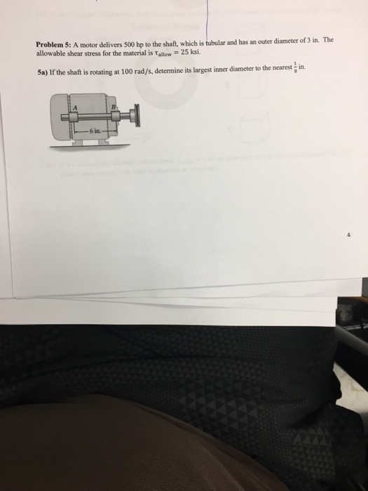 A motor delivers 500 hp to the shaft, which is tub