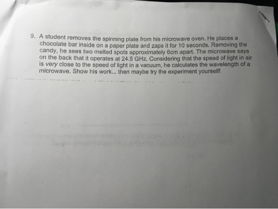 9. A student removes the spinning plate from his microwave oven. He places a chocolate bar inside on a paper plate and zaps i