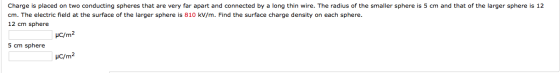 Charge is placed on two conducting spheres that ar