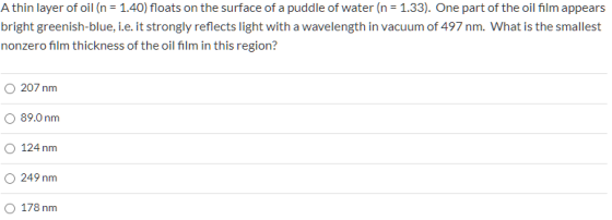 A thin layer of oil (n = 1.40) floats on the surface of a puddle of water (n = 1.33). One part of the oil film appears bright