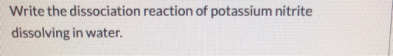 Write the dissociation reaction of potassium nitrite dissolving in water.