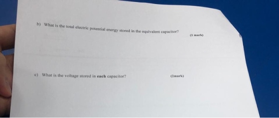b) What is the total electric potential energy stored in the equivalent capacitor c) What is the voltage stored in each capac