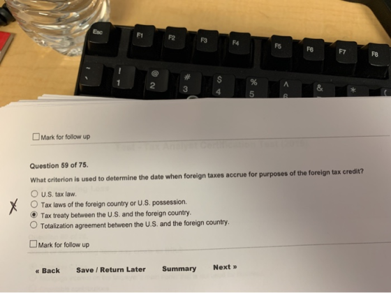 F6 F7 Mark for follow up Question 59 of 75. What criterion is used to determine the date when foreign taxes accrue for purpos