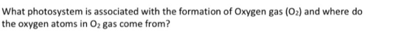 What photosystem is associated with the formation of Oxygen gas (O2) and where do the oxygen atoms in O2 gas come from?