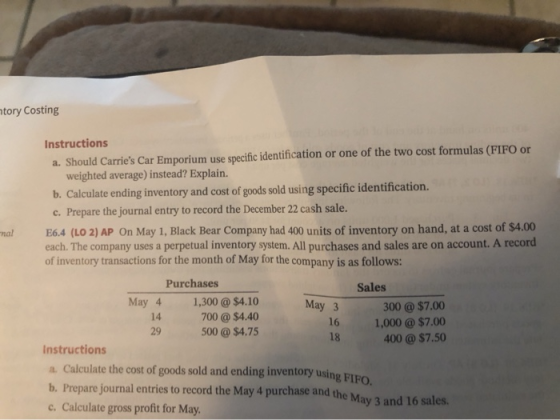 tory Costing nal Instructions a. Should Carries Car Emporium use specific identification or one of the two cost formulas (FI
