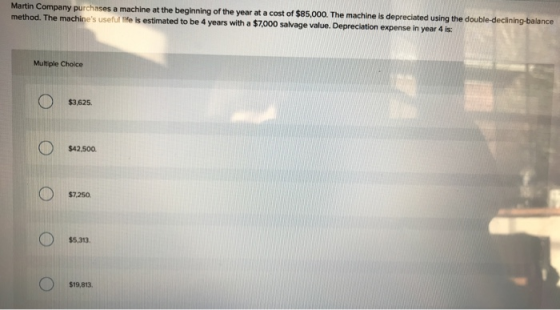 Martin Company purchases a machine at the beginning of the year at a cost of $85,000. The machine is depreciated using the do