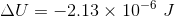\Delta U = -2.13 \times 10^{-6}\,\, J