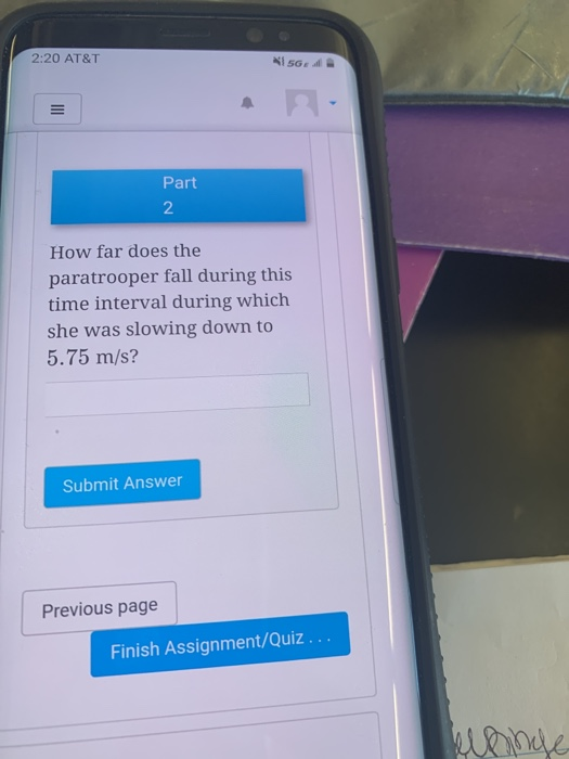 2:20 AT&T Part How far does the paratrooper fall during this time interval during which she was slowing down to 5.75 m/s? Sub
