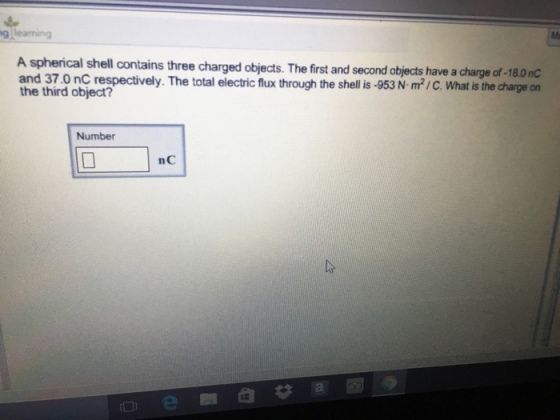 A spherical shell contains three charged objects T