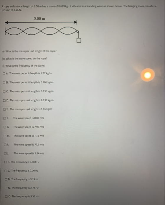 A rope with a total length of 6.50 m has a mass of 0.689 kg. It vibrates in a standing wave as shown below. The hanging mass