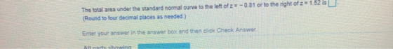 The total area under the standard normal curve to the left of z = -0.81 or to the right of z=1.52 is (Round to four decimal p