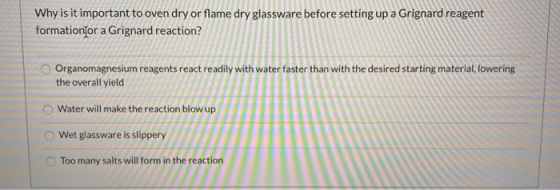 Why is it important to oven dry or flame dry glassware before setting up a Grignard reagent formation or a Grignard reaction?